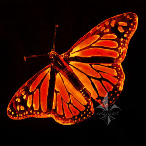 monarch butterfly ice sculpture with color lighting